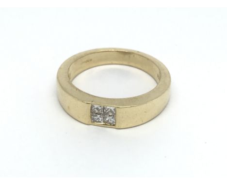 An 18ct gold ring set with four princess cut diamonds, approx 9g and approx size Q-R.