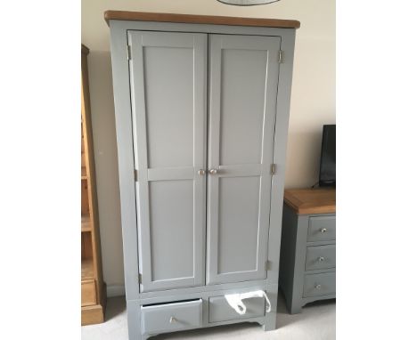 A modern grey painted and light oak bedroom suite comprising a double flighted chest of drawers a wardrobe bed mattress and l