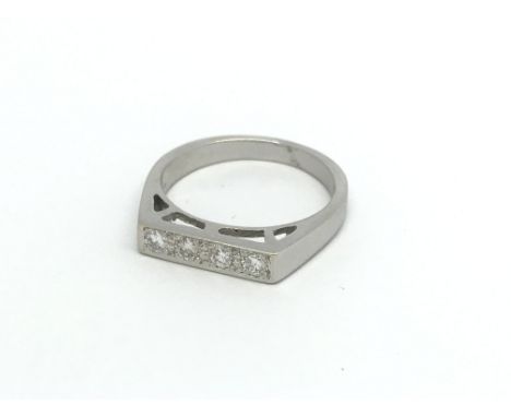 An 18ct white gold four stone diamond ring, approx .25ct, approx 4.6g and approx size O.