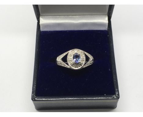 A 9ct white gold tanzanite and diamond ring, approx 4.3g and approx size P.