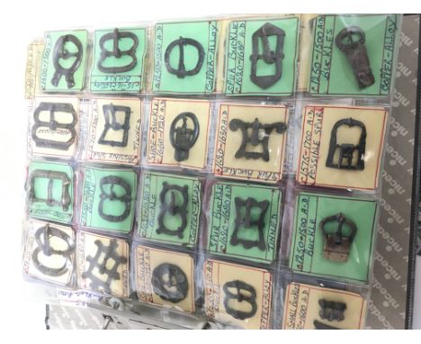 An interesting album of antiquities mainly metal detector finds. The eleven page album with buckles ring brooches rings seals
