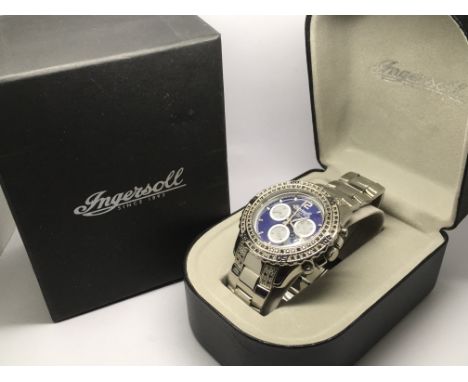 A boxed Ingersoll gents black diamond bezel chronograph watch.