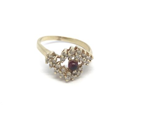 A 14ct cabochon ruby and diamond ring, (Q), 4.2g.