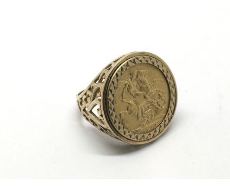 A 9ct gold ring set with an 1895 sovereign, approx 13.9g and approx size V.