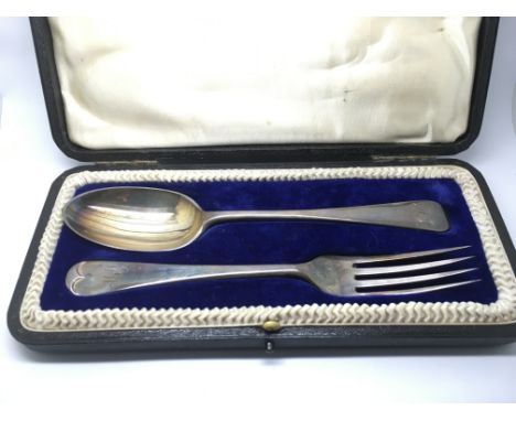 A cased silver fork and spoon, London hallmarks.