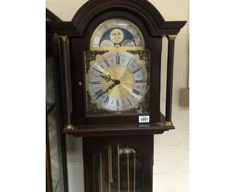 A 20th century mahogany cased longcase clock the moon roller dial above a glazed door with visible weights. Not seen working 