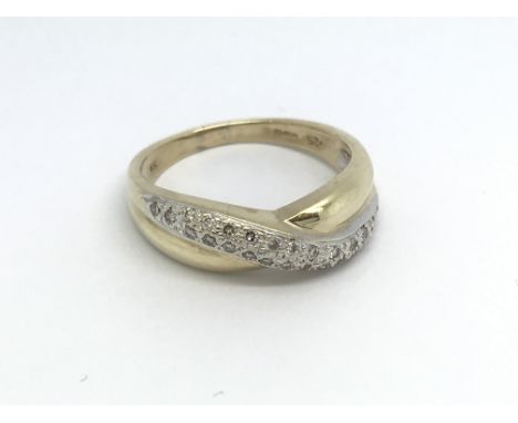 A 9ct gold and diamond ring, (P), 3.7g.