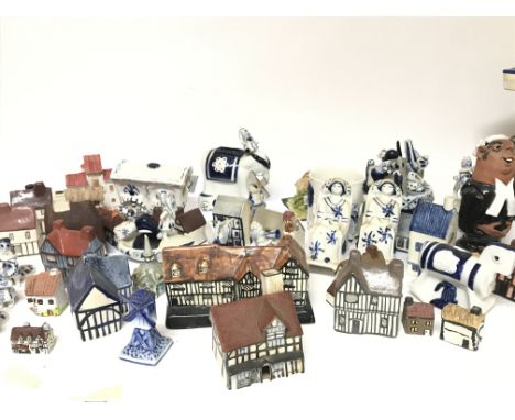 A collection of ceramic cottages including a a Goss model of Shakespeare cottage (a lot)