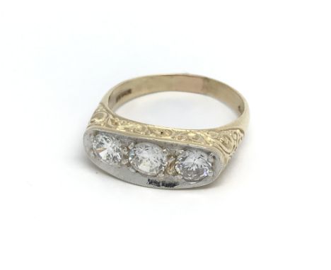 A 9ct gold and CZ gypsy ring, (V), 6.3g.