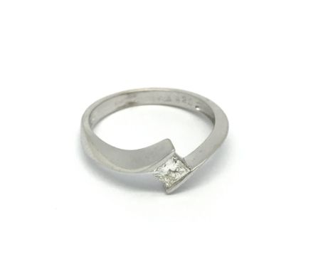 An 18carat gold ring set with a princess cut diamond 0.25 of a carat diamond ring size K-L