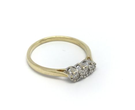 An 18carat gold ring set with three diamonds. ring size S.