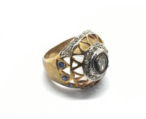 An Indian gold, diamond and sapphire ring, approx 10g and approx size P.