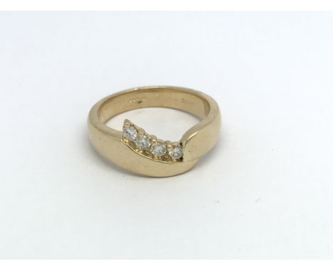 A heavy 18ct gold and diamond ring, (L.5), approx .20ct diamonds, 6.4g.