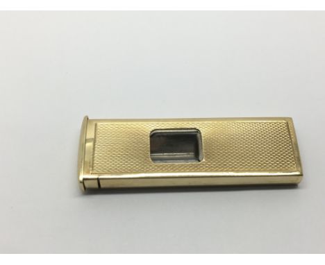 A 9ct gold cigar cutter, approx 17g.