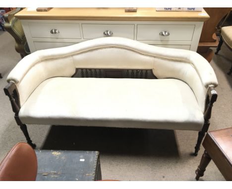 An Edwardian walnut sofa with white cream upholstery and turned supports - NO RESERVE