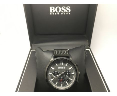 A boxed gents Hugo Boss chronograph watch.
