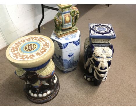 A Chinese blue and white garden seat and two other ceramic garden seats in the form of elephants and one smaller elephant (4)