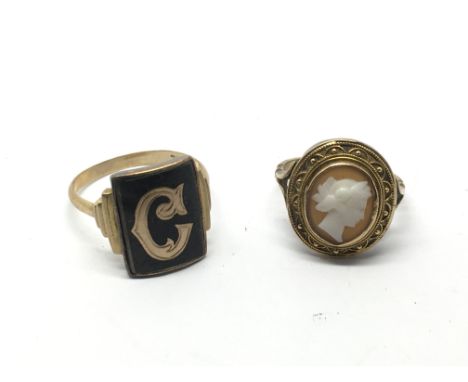 A 9ct gold black enamel ring and an unmarked gold cameo ring (2), approx sizes Q and K-L.