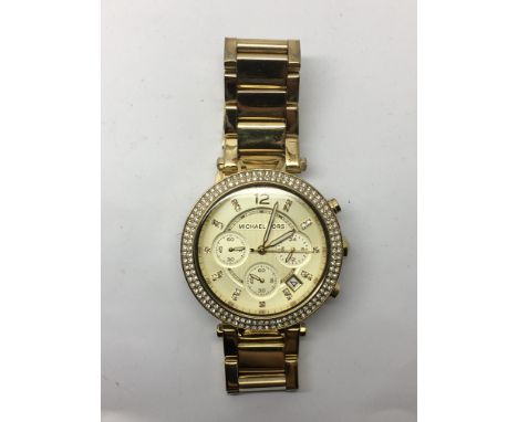 A Michael Kors ladies chronograph watch.