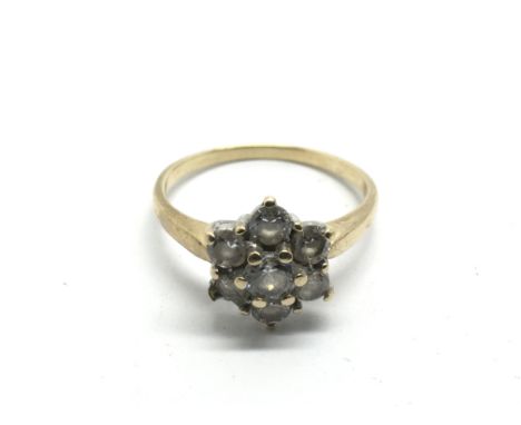 A 9ct gold ring set with CZ stones, approx 3g and approx size O-P.