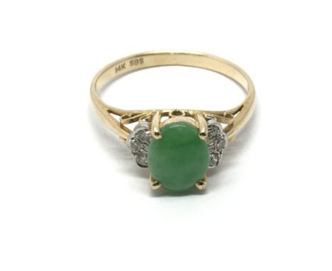 A 14ct gold ring set with jade and diamonds, approx 2.2g and approx size M-N.