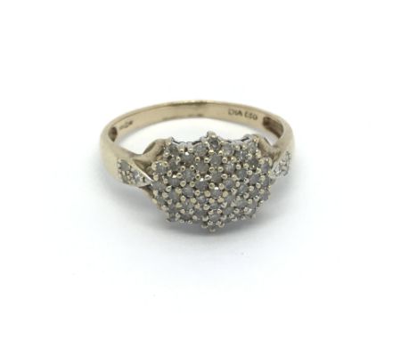 A 9ct gold diamond cluster ring, approx 2.9g and approx size Q.