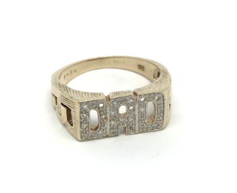 A 9carat gold ring DAD set with diamonds ring size W.