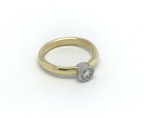 An 18ct gold and diamond 0.33ct solitaire ring, (M), 4.4g.