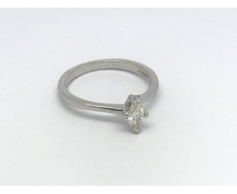 An 18ct white gold solitaire diamond ring set with a marquise cut stone, approx 3.1g and approx size O.