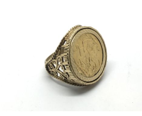 A 9ct gold ring inset with a full sovereign dated 1913, approx 15.4g and approx size R-S.