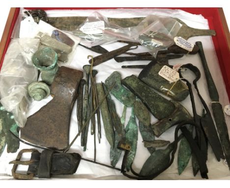 A case containing Bronze Age arrow heads other metal detector discoveryÕs antiquities axe heads and other very interesting fi