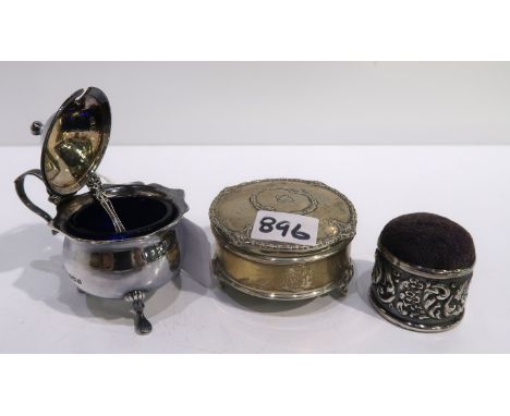 A lot comprising a silver jewellery box, Birmingham 1912, a silver mustard pot &amp; a pin cushion (3) Condition Report: Avai