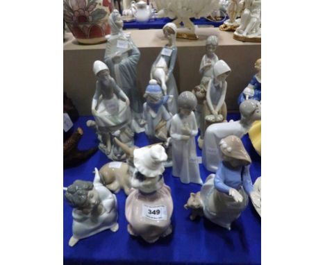 A group of Lladro and Nao figures including a donkey, angel, children etc Condition Report: Two are other makes and the girl 