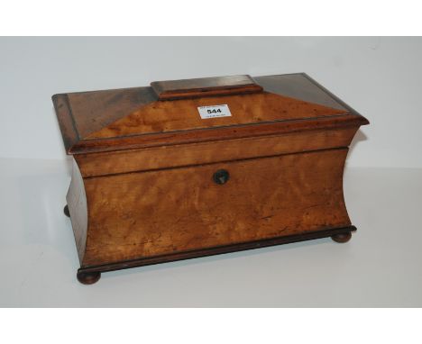 A 19th century satin wood sarcophagus shaped two-division tea caddy on bun feet, 38cm wide Condition Report: Available upon r