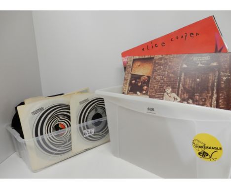 A collection long playing LP vinyl records with Tubeway Army, The Moody Blues, The Rolling Stones, Alice Cooper, The Who, Rox