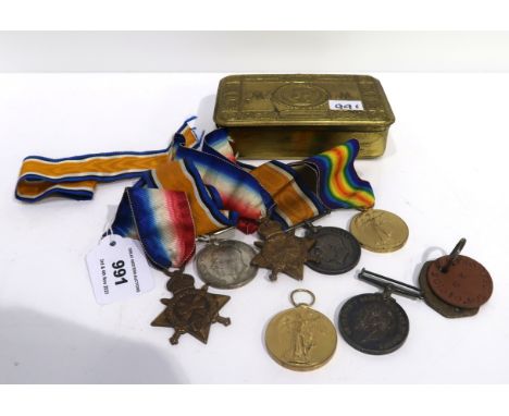 A lot comprising a WW1 group of three to 010103 Pte. J. Thomson A.O.C. with his dogtags, a WW1 group of three to 1076 Pte. R.