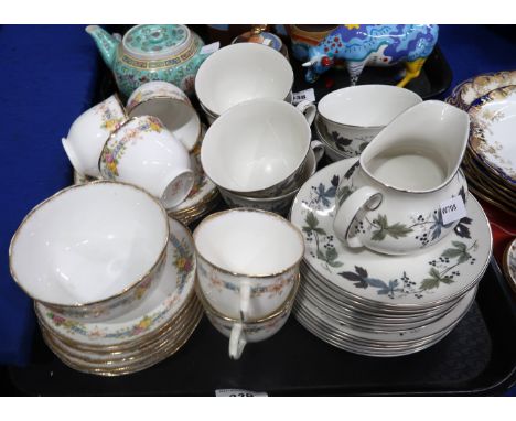 A lot comprising a Royal Doulton Burgundy pattern part tea service &amp; A Royal Albert floral and gilt decorated part tea se