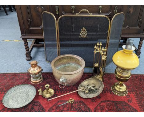 Mixed metalware to include copper Tung Woo Hong Kong anchor lantern, an embossed plate, brass oil lamp, fir guard and firesid