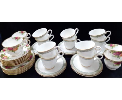 A set of ten Royal Doulton Isabella bone china tea cups and saucers, a quantity of Royal Albert Old Country Roses teacups, sa