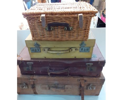 Three vintage leather suitcases, together with an Amberley hamper with fitted contents Location: 