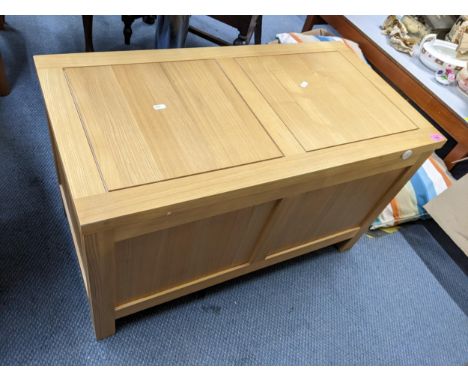 A modern light oak panelled blanket chest, 50.5cm h x 85.5cm wLocation: 