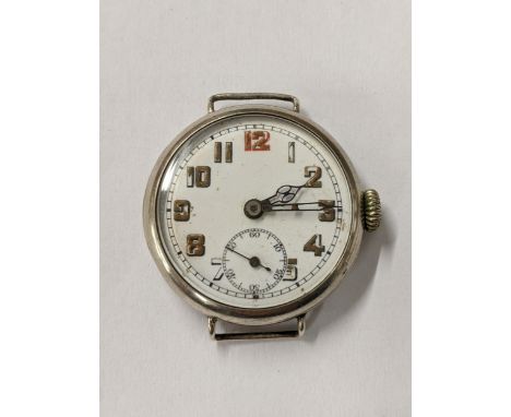 A WWI silver cased trench watch having a white enamel dial with Arabic numerals Location: 