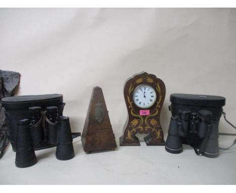 A late Victorian inlaid mahogany balloon shaped mantel clock (with key), a walnut cased Metronome de Maelzel, and a Greenkat 
