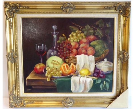 L SUTTON; a&nbsp;gilt-framed oil on artist's board still-life study of a decanter, wine glass and various fruits upon a table