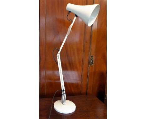 A cream Anglepoise lamp