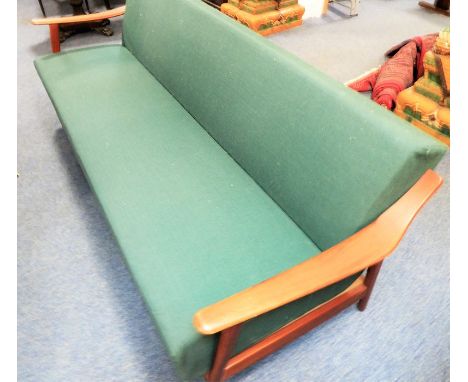 A Danish mid-century teak sofa bed with ski arms and pencil legs, one-click action (1.83m long)