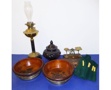 A mixed lot comprising an early 20th century set of brass postal scales with weights, an oil lamp (converted), two antique-st