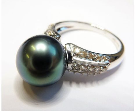 An 18-carat white-gold, grey/black cultured pearl and diamond ring (The cost of UK postage via Royal Mail Special Delivery fo