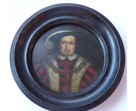 A late 18th to early 19th century circular oil on panel shoulder-length portrait miniature of Henry VIII within an ebonised f