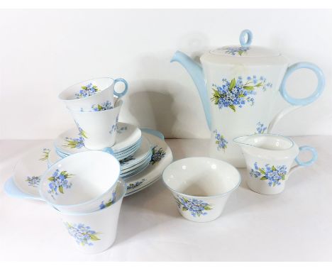 A good mid-20th century four-place coffee service by Shelley; comprising coffee pot, sugar bowl, cream jug, two-handled cake 